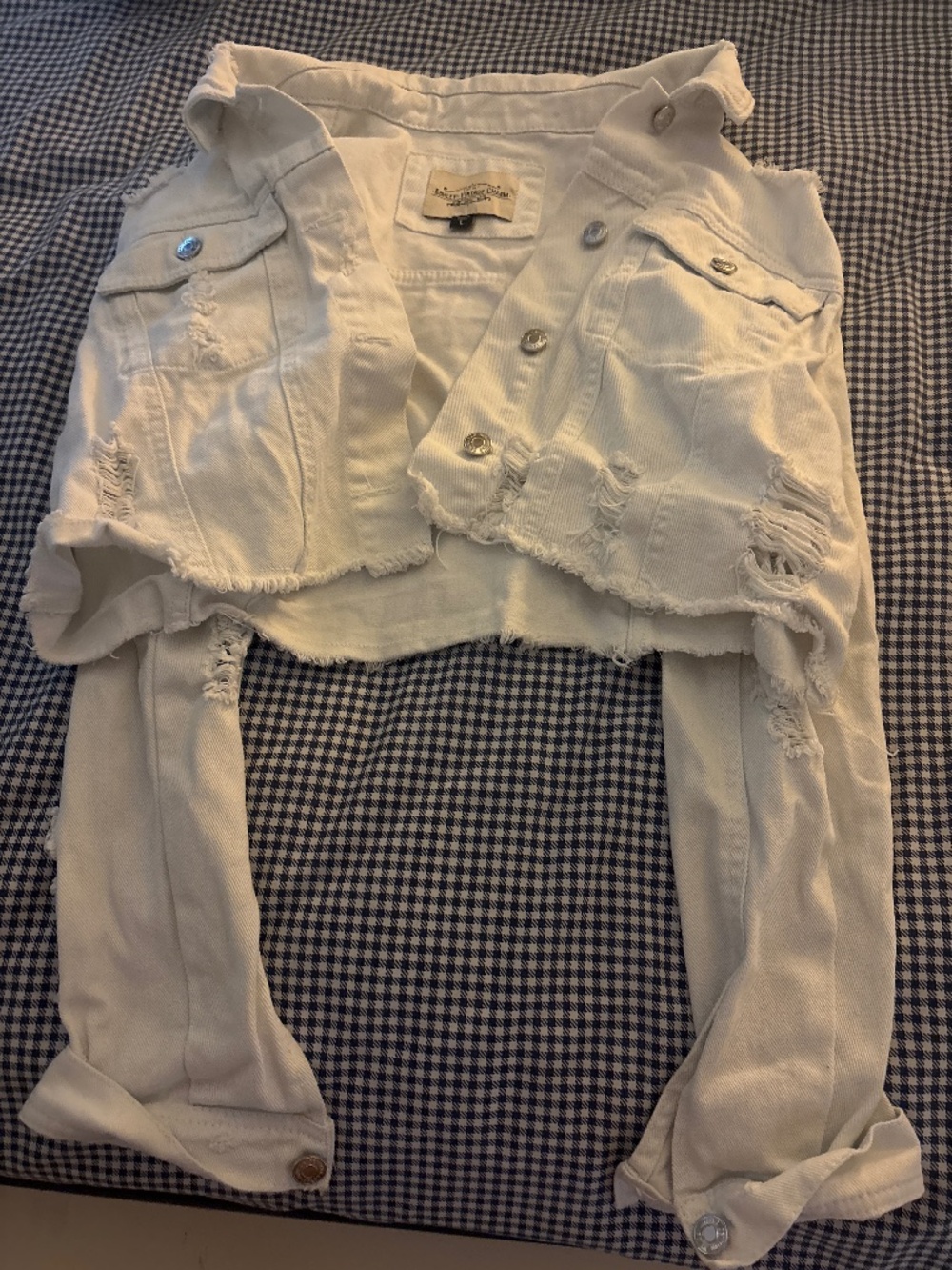 White distressed denim jacket